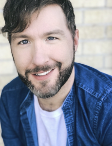 A man smiling. 